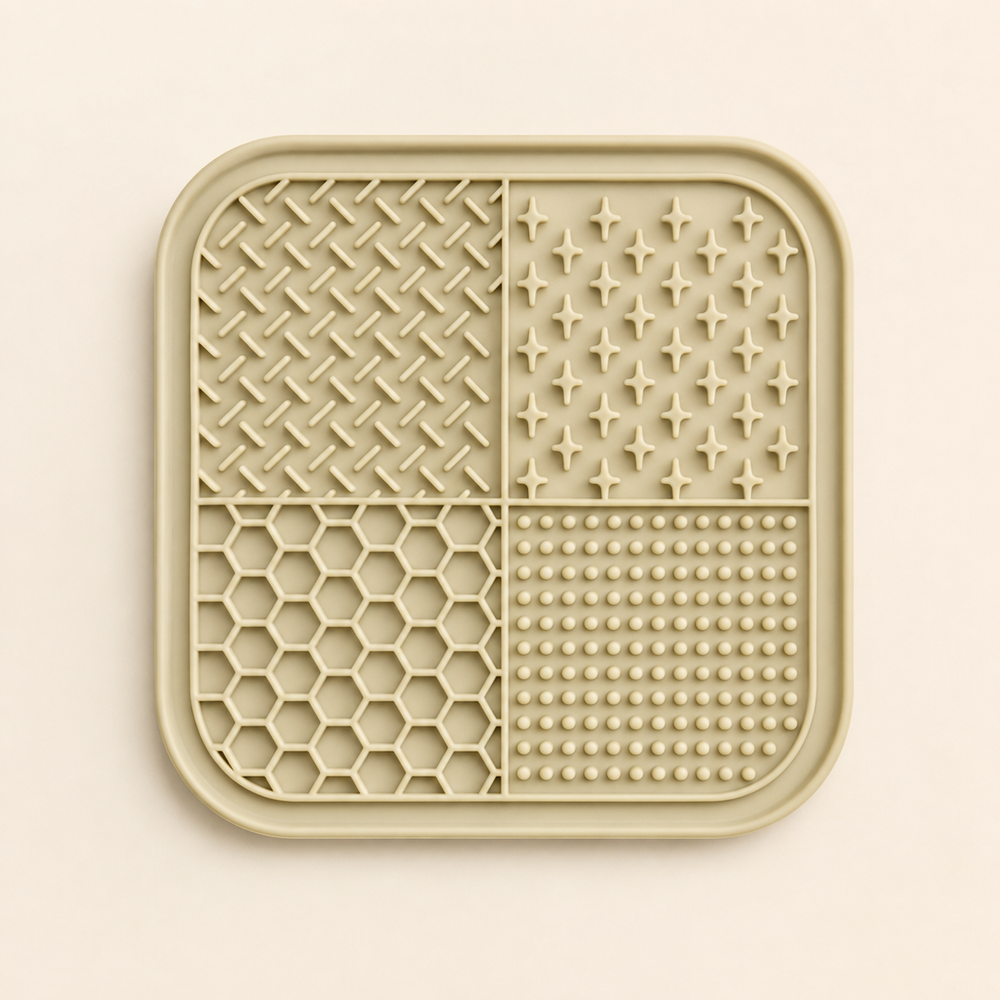 Beige four-zone Bupba silicone lick mat on a warm cream background